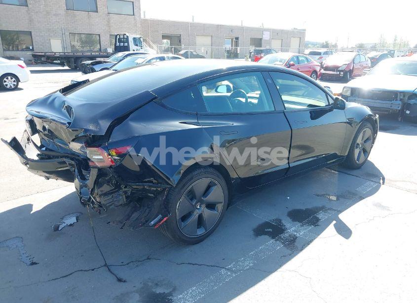 Photo 4 of 2021 Tesla Model 3 STANDARD RANGE PLUS REAR-WHEEL DRIVE (VIN 5YJ3E1EA5MF939299)