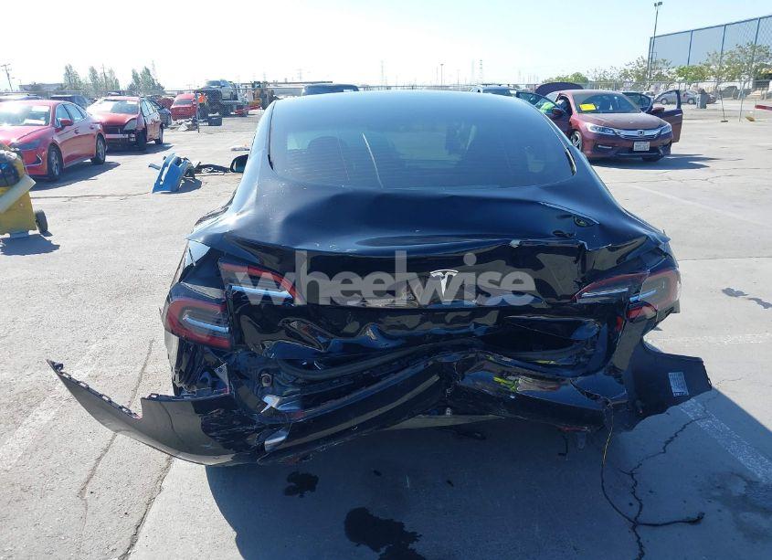 Photo 6 of 2021 Tesla Model 3 STANDARD RANGE PLUS REAR-WHEEL DRIVE (VIN 5YJ3E1EA5MF939299)