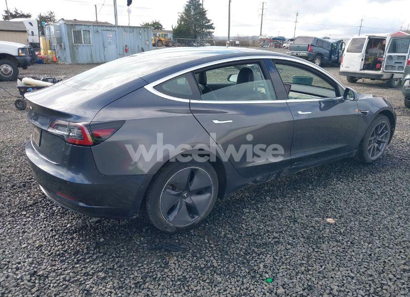 Photo 4 of 2020 Tesla Model 3 STANDARD RANGE PLUS REAR-WHEEL DRIVE/STANDARD RANGE REAR-WHEEL DRIVE (VIN 5YJ3E1EA7LF611574)