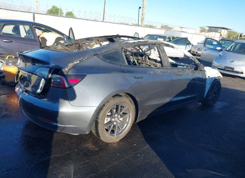 Photo 4 of 2021 Tesla Model 3 STANDARD RANGE PLUS REAR-WHEEL DRIVE (VIN 5YJ3E1EA7MF051704)
