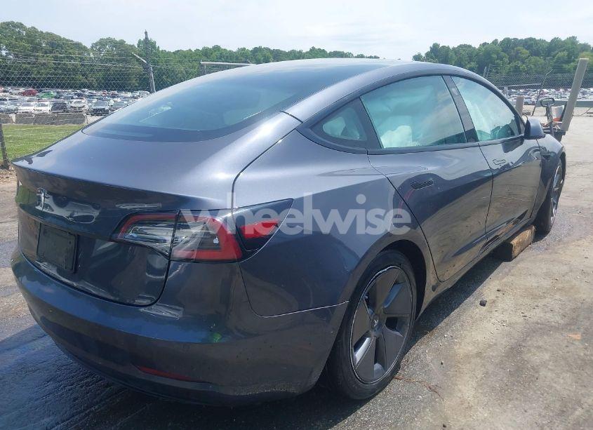 Photo 4 of 2021 Tesla Model 3 STANDARD RANGE PLUS REAR-WHEEL DRIVE (VIN 5YJ3E1EA7MF088283)