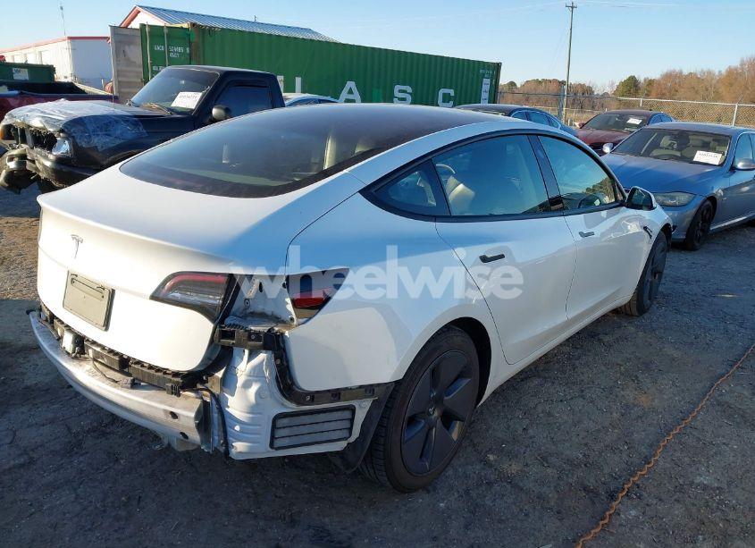 Photo 4 of 2021 Tesla Model 3 STANDARD RANGE PLUS REAR-WHEEL DRIVE (VIN 5YJ3E1EA7MF861009)
