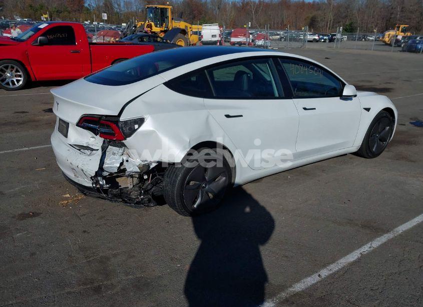 Photo 4 of 2021 Tesla Model 3 STANDARD RANGE PLUS REAR-WHEEL DRIVE (VIN 5YJ3E1EA7MF991548)