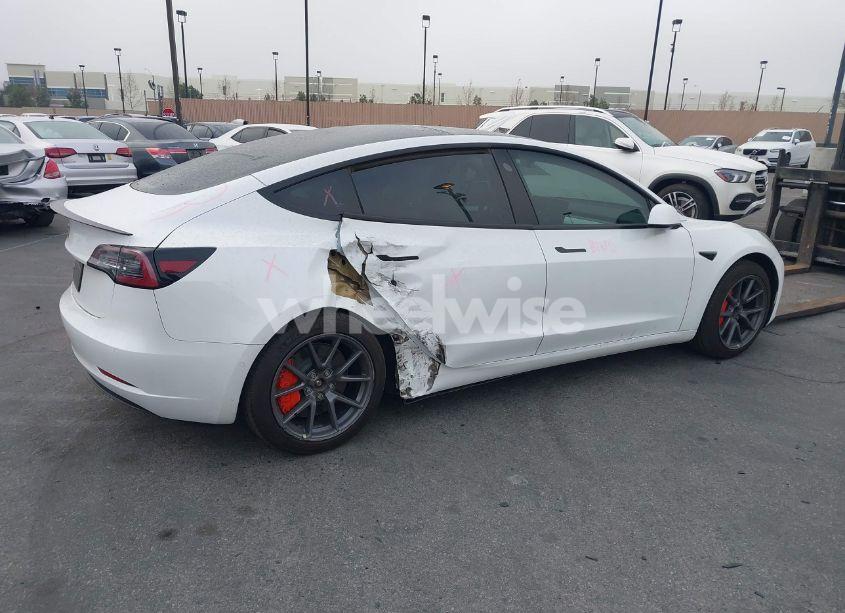 Photo 4 of 2021 Tesla Model 3 STANDARD RANGE PLUS REAR-WHEEL DRIVE (VIN 5YJ3E1EA7MF994322)