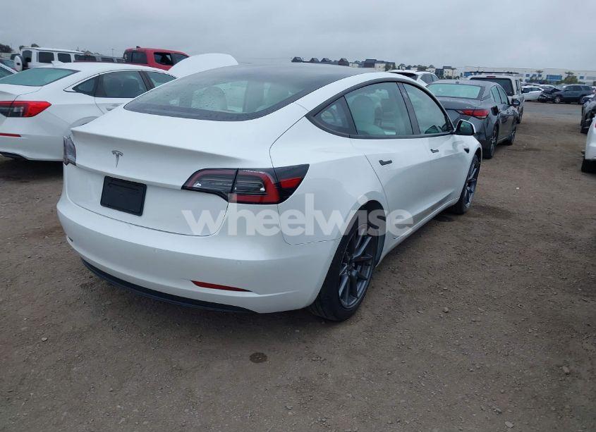 Photo 4 of 2021 Tesla Model 3 STANDARD RANGE PLUS REAR-WHEEL DRIVE (VIN 5YJ3E1EA8MF029419)