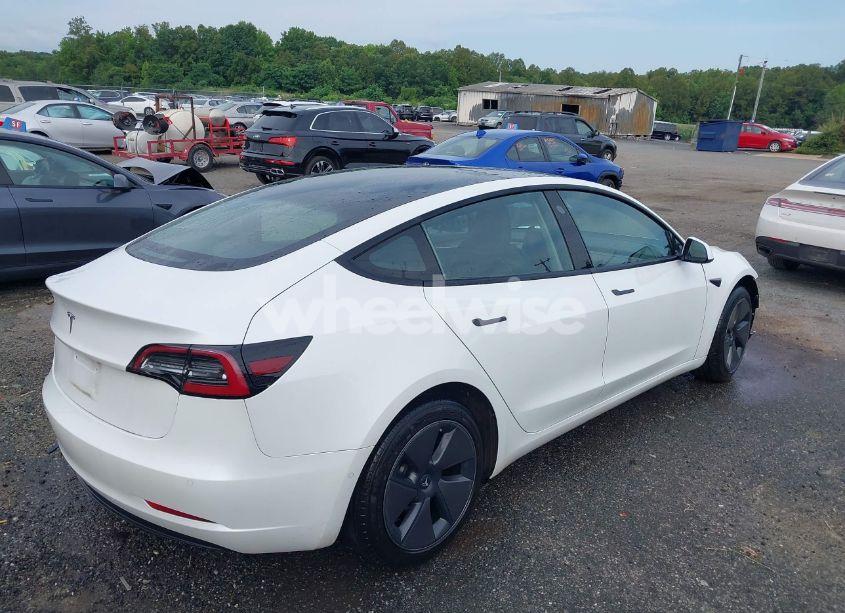 Photo 4 of 2021 Tesla Model 3 STANDARD RANGE PLUS REAR-WHEEL DRIVE (VIN 5YJ3E1EA8MF062940)