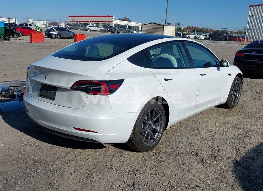 Photo 4 of 2021 Tesla Model 3 STANDARD RANGE PLUS REAR-WHEEL DRIVE (VIN 5YJ3E1EA8MF851900)