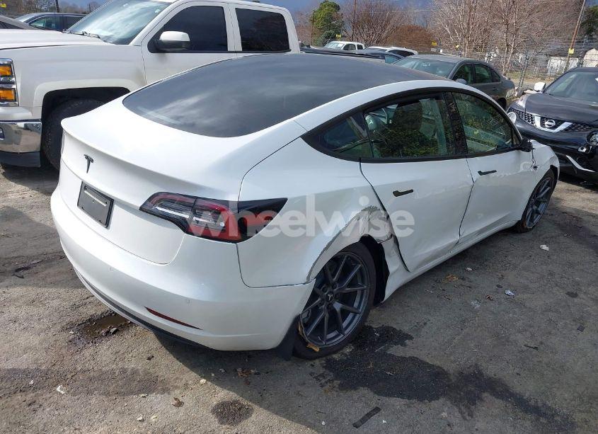 Photo 4 of 2021 Tesla Model 3 STANDARD RANGE PLUS REAR-WHEEL DRIVE (VIN 5YJ3E1EA8MF977447)