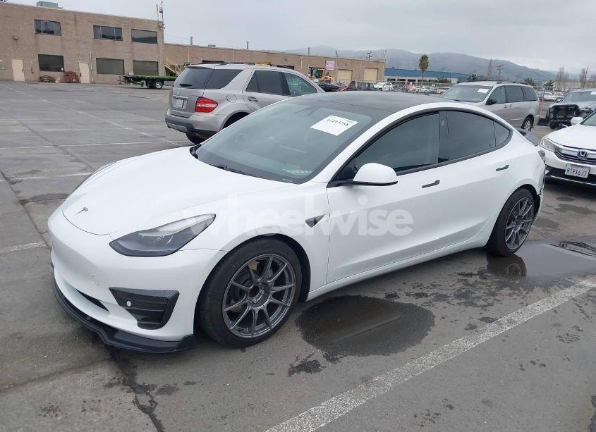 Photo 2 of 2021 Tesla Model 3 STANDARD RANGE PLUS REAR-WHEEL DRIVE (VIN 5YJ3E1EA9MF051204)