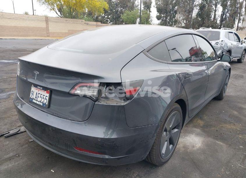 Photo 4 of 2021 Tesla Model 3 STANDARD RANGE PLUS REAR-WHEEL DRIVE (VIN 5YJ3E1EA9MF100420)