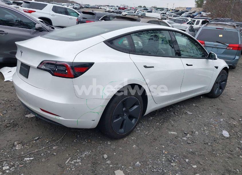 Photo 4 of 2021 Tesla Model 3 STANDARD RANGE PLUS REAR-WHEEL DRIVE (VIN 5YJ3E1EA9MF859956)