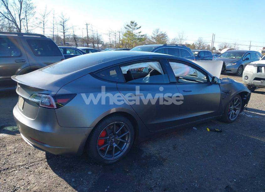 Photo 4 of 2021 Tesla Model 3 STANDARD RANGE PLUS REAR-WHEEL DRIVE (VIN 5YJ3E1EA9MF915135)