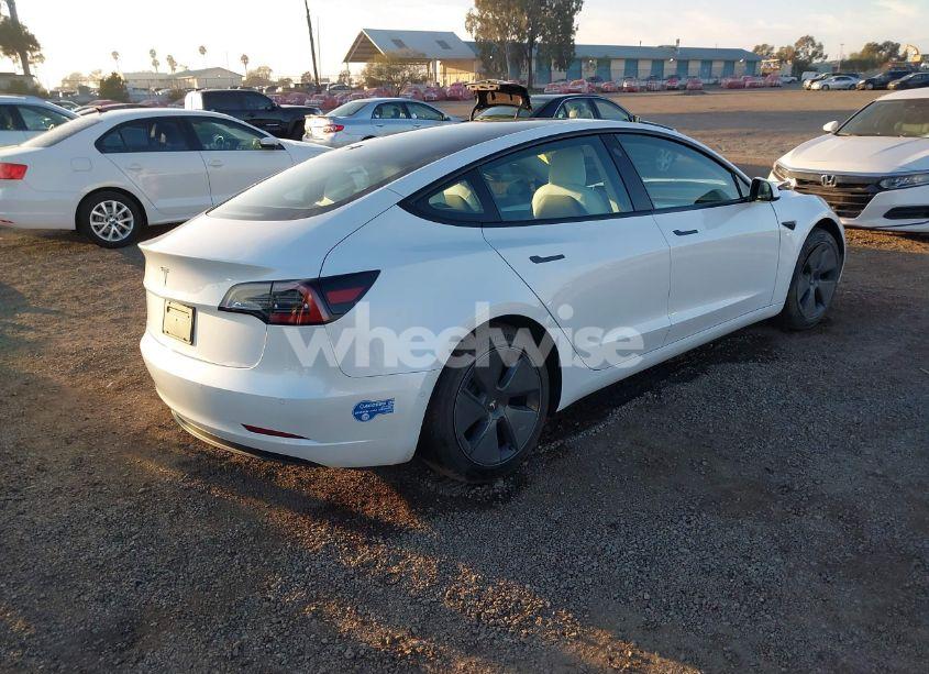 Photo 4 of 2021 Tesla Model 3 STANDARD RANGE PLUS REAR-WHEEL DRIVE (VIN 5YJ3E1EA9MF989882)