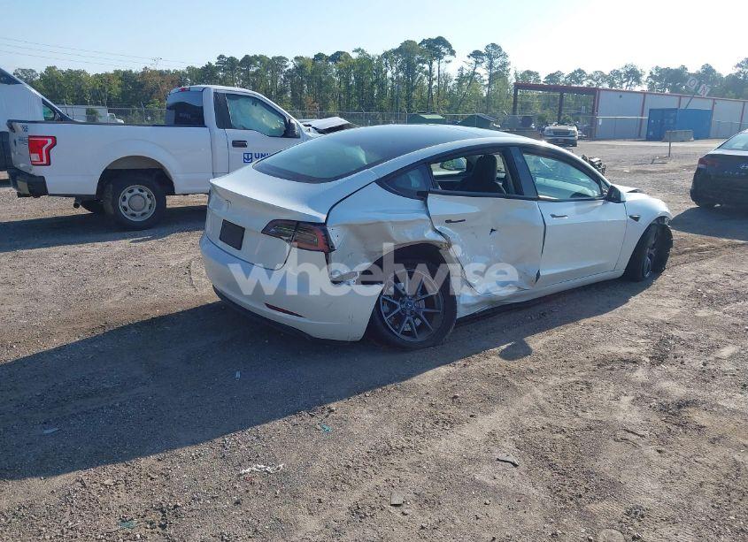 Photo 4 of 2023 Tesla Model 3 REAR-WHEEL DRIVE (VIN 5YJ3E1EA9PF557880)