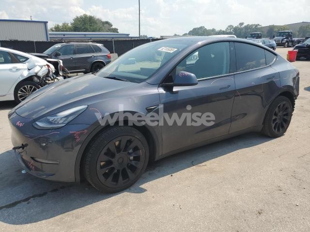 Photo 2 of 2021 TESLA MODEL Y (VIN 5YJYGAEE9MF232063)