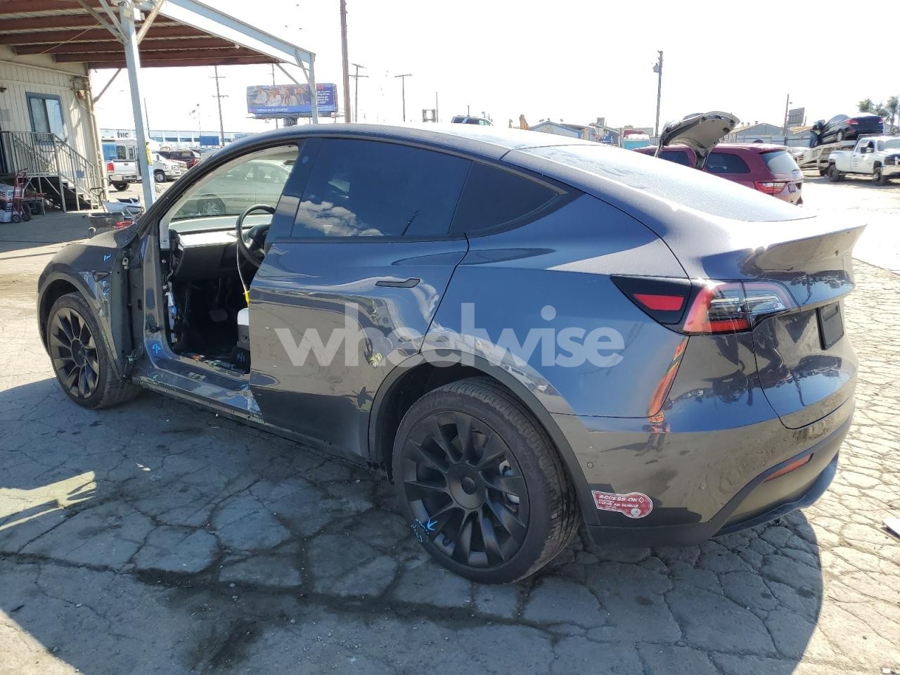 Photo 2 of 2021 TESLA MODEL Y (VIN 5YJYGDEE0MF065951)