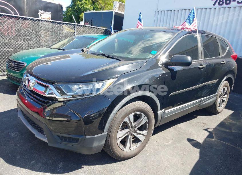 Photo 2 of 2017 Honda Cr-v LX (VIN 7FARW5H30HE004035)