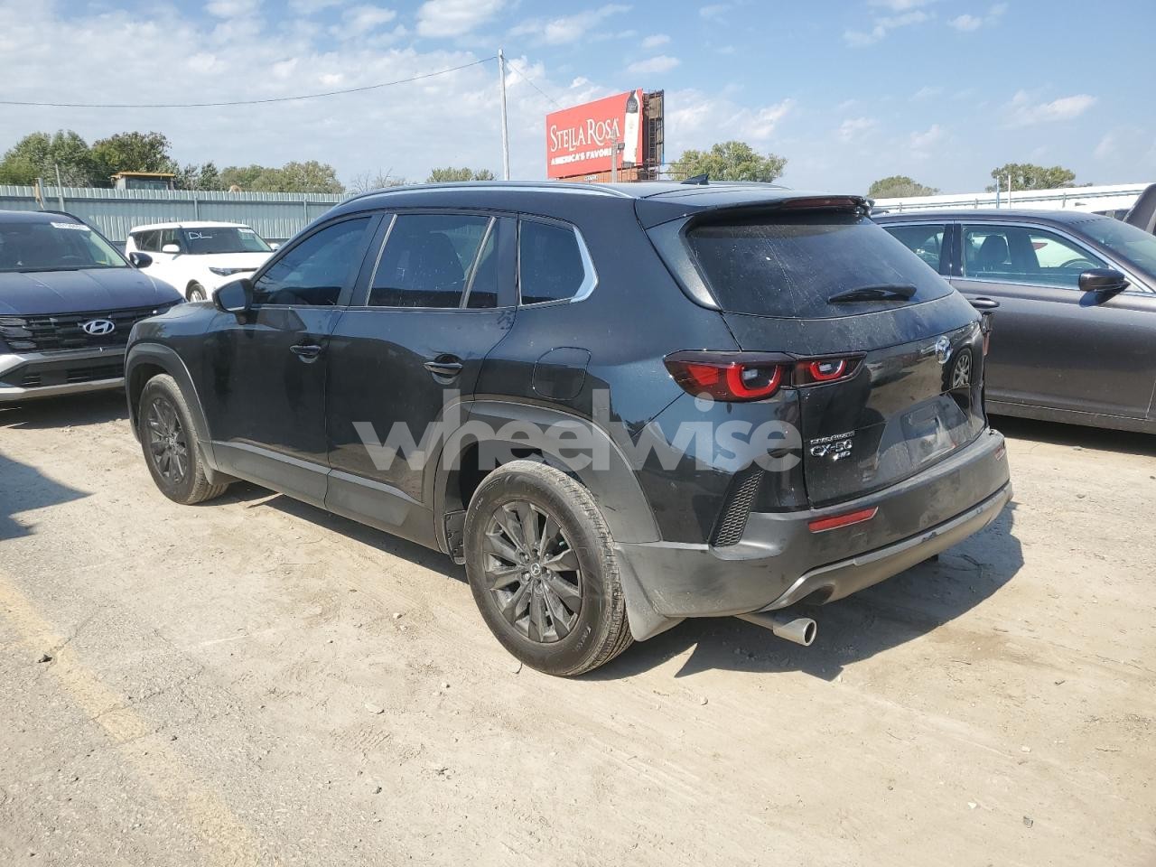 Photo 2 of 2024 MAZDA CX-50 PREMIUM (VIN 7MMVABDM5RN191393)