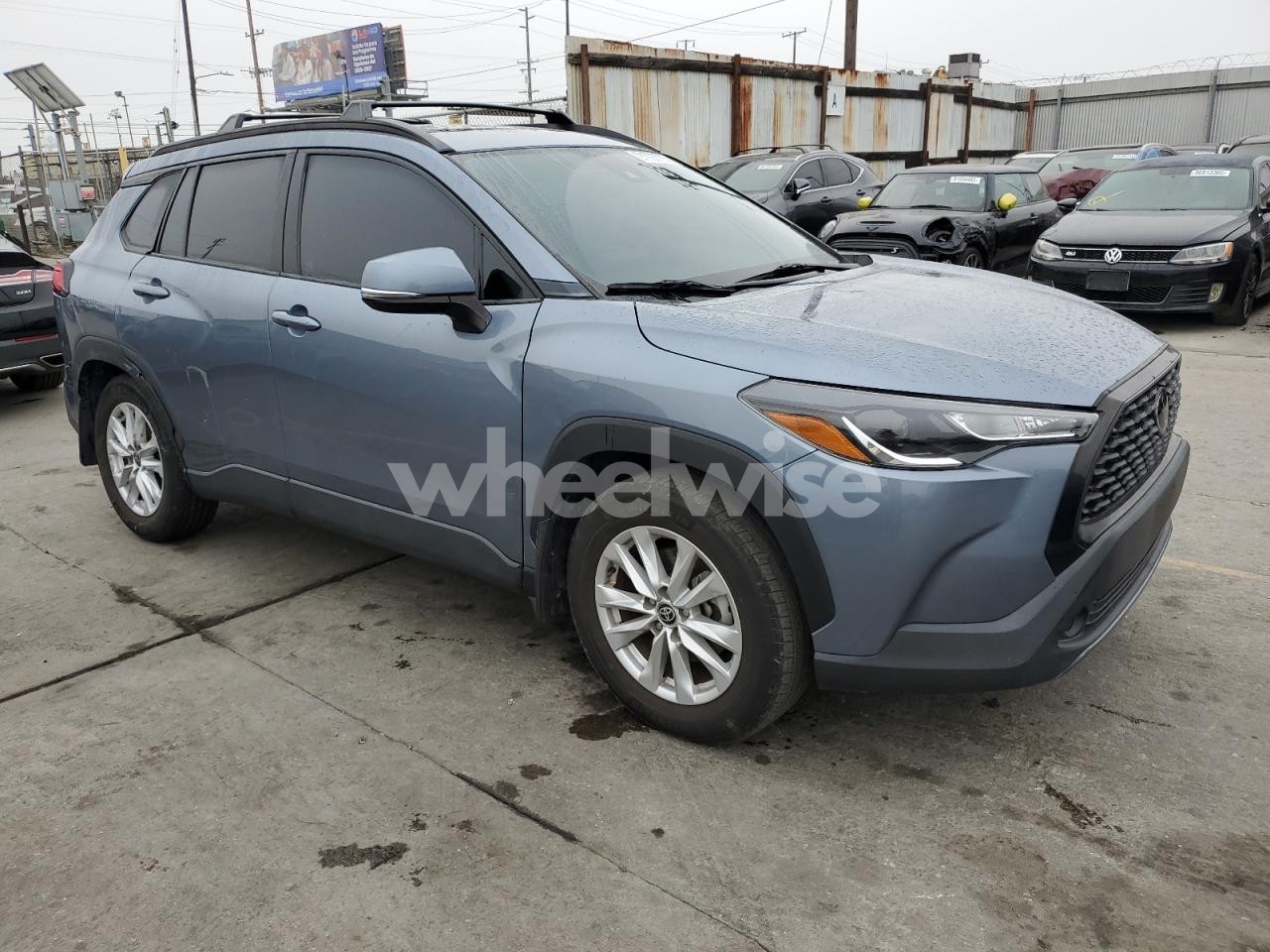 Photo 4 of 2022 TOYOTA COROLLA CROSS LE (VIN 7MUBAAAG3NV033480)