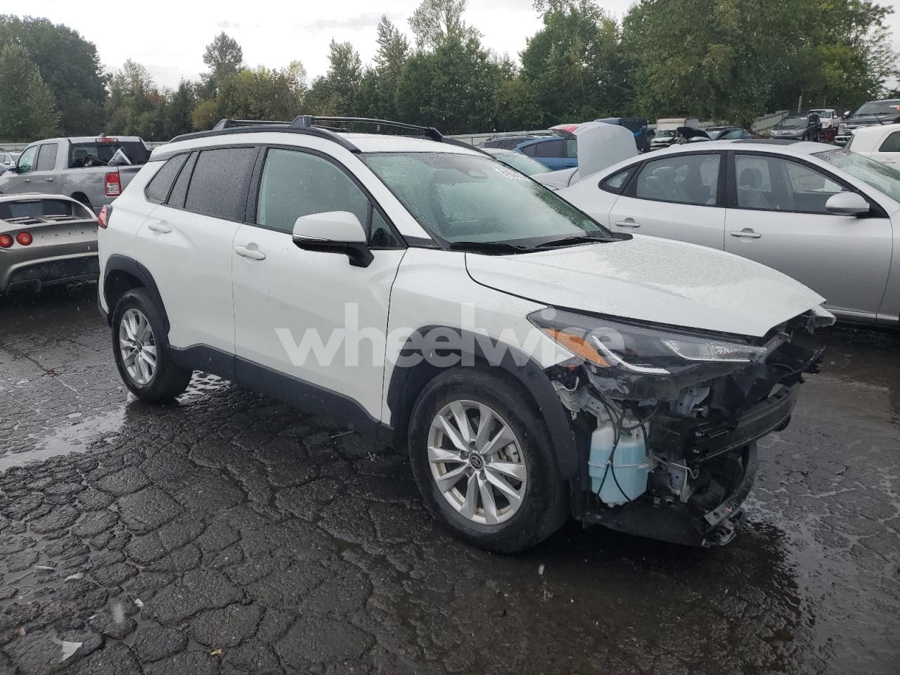 Photo 4 of 2023 TOYOTA COROLLA CROSS LE (VIN 7MUCAABG4PV051878)