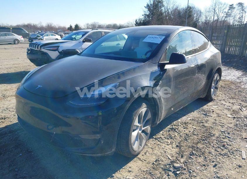 Photo 2 of 2023 Tesla Model Y AWD/LONG RANGE DUAL MOTOR ALL-WHEEL DRIVE (VIN 7SAYGAEE0PF646470)