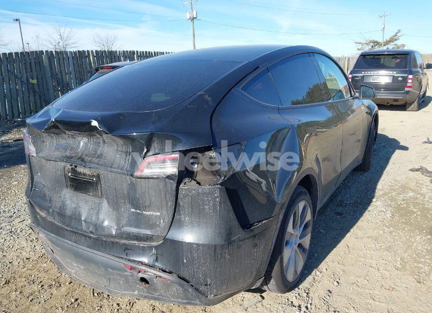 Photo 4 of 2023 Tesla Model Y AWD/LONG RANGE DUAL MOTOR ALL-WHEEL DRIVE (VIN 7SAYGAEE0PF646470)
