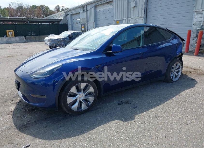 Photo 2 of 2023 Tesla Model Y AWD/LONG RANGE DUAL MOTOR ALL-WHEEL DRIVE (VIN 7SAYGAEE0PF892595)