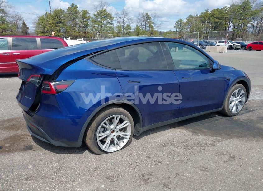 Photo 4 of 2023 Tesla Model Y AWD/LONG RANGE DUAL MOTOR ALL-WHEEL DRIVE (VIN 7SAYGAEE0PF892595)