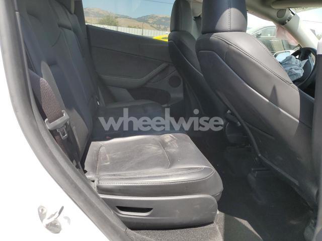 Photo 2 of 2023 TESLA MODEL Y (VIN 7SAYGAEE0PF912330)