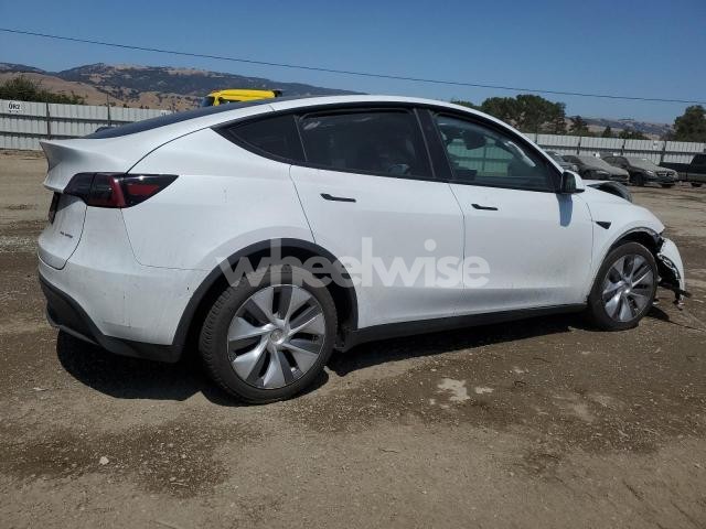 Photo 6 of 2023 TESLA MODEL Y (VIN 7SAYGAEE0PF912330)