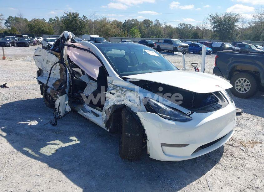2023 Tesla Model Y AWD/LONG RANGE DUAL MOTOR ALL-WHEEL DRIVE (VIN 7SAYGAEE1PF665934) main photo