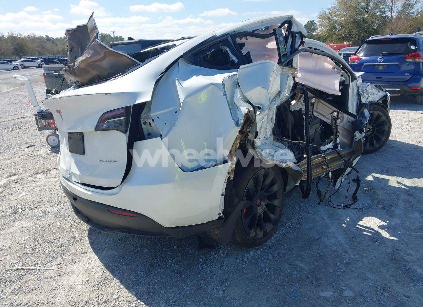 Photo 4 of 2023 Tesla Model Y AWD/LONG RANGE DUAL MOTOR ALL-WHEEL DRIVE (VIN 7SAYGAEE1PF665934)