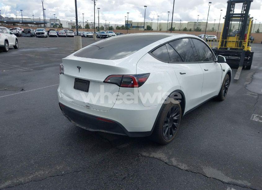Photo 4 of 2023 Tesla Model Y AWD/LONG RANGE DUAL MOTOR ALL-WHEEL DRIVE (VIN 7SAYGAEE2PF668910)