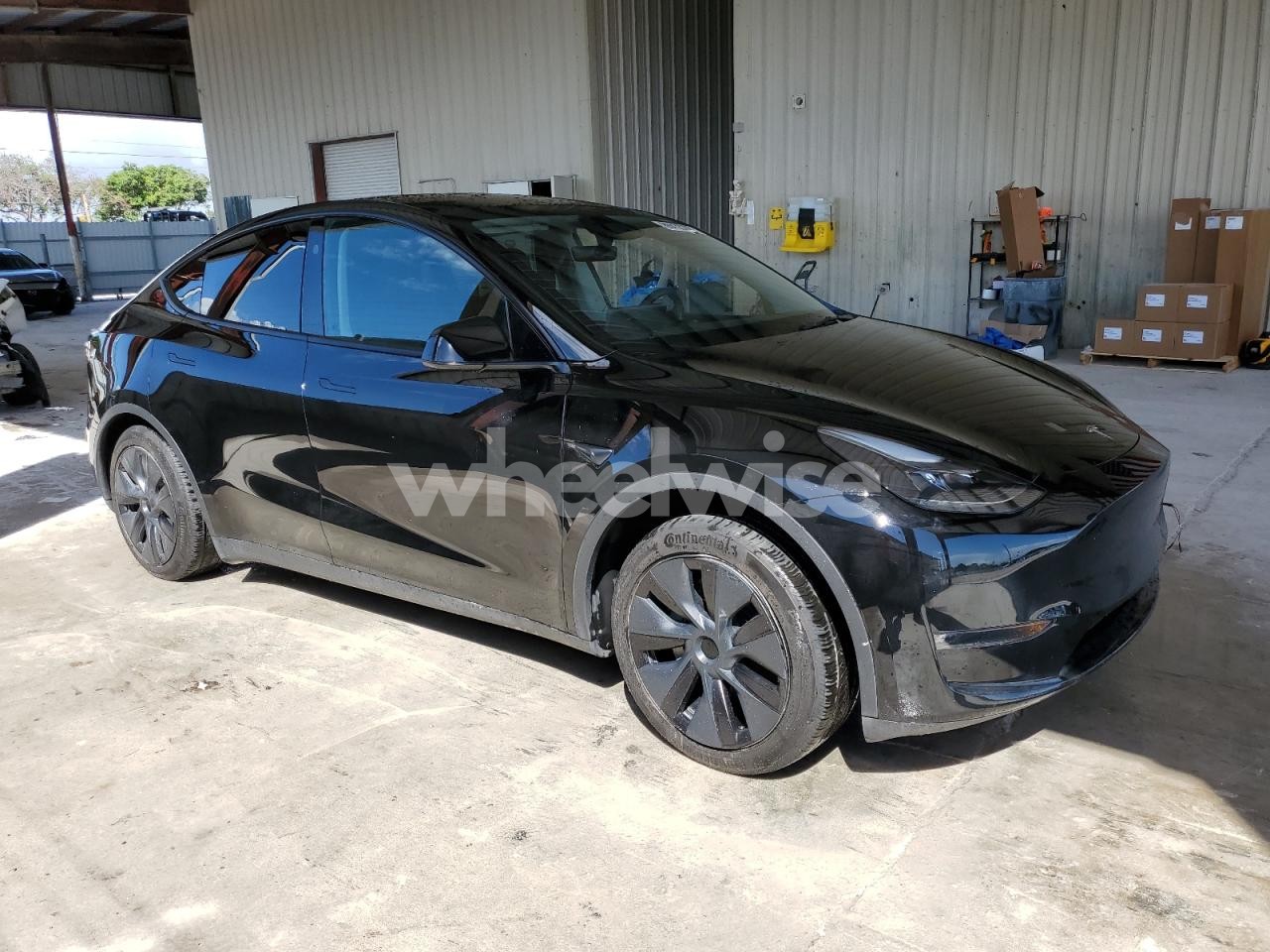 Photo 4 of 2024 TESLA MODEL Y (VIN 7SAYGAEE2RF212375)