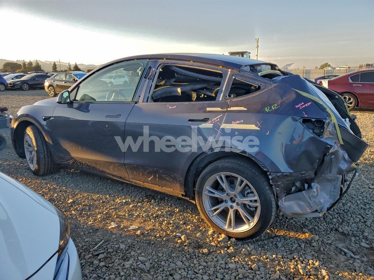 Photo 2 of 2023 TESLA MODEL Y (VIN 7SAYGAEE3PF876486)