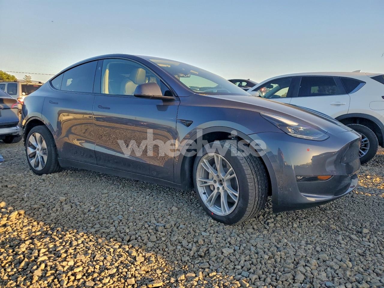 Photo 4 of 2023 TESLA MODEL Y (VIN 7SAYGAEE3PF876486)