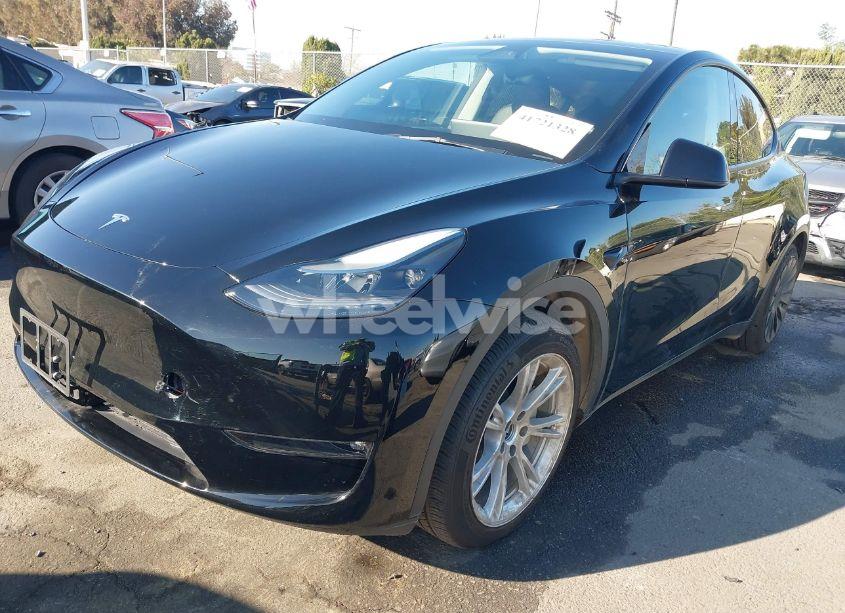 Photo 2 of 2023 Tesla Model Y AWD/LONG RANGE DUAL MOTOR ALL-WHEEL DRIVE (VIN 7SAYGAEE3PF883034)