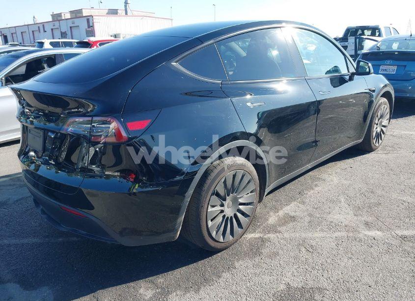Photo 4 of 2023 Tesla Model Y AWD/LONG RANGE DUAL MOTOR ALL-WHEEL DRIVE (VIN 7SAYGAEE3PF883034)