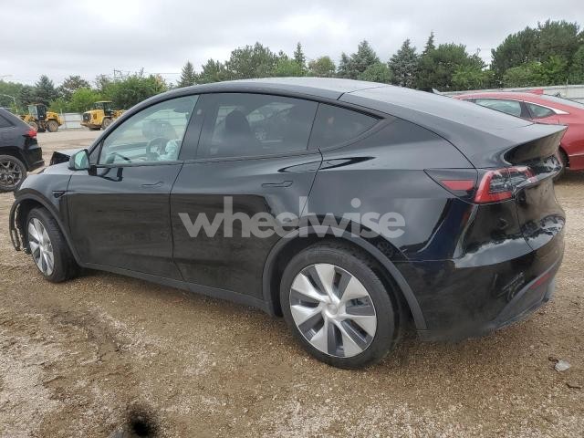 Photo 6 of 2023 TESLA MODEL Y (VIN 7SAYGAEE4PF857946)