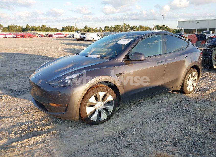 Photo 2 of 2023 Tesla Model Y AWD/LONG RANGE DUAL MOTOR ALL-WHEEL DRIVE (VIN 7SAYGAEE4PF878635)
