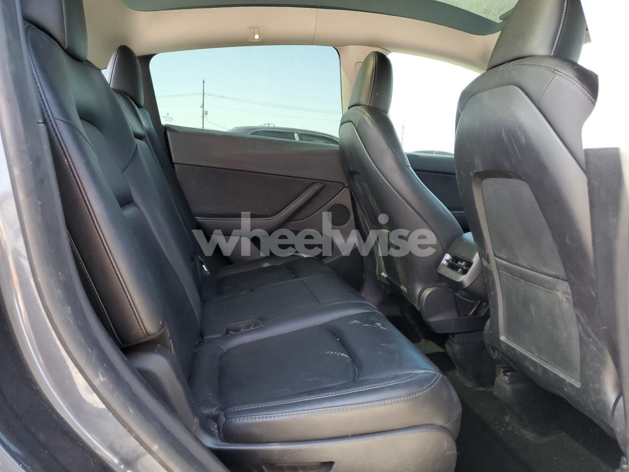 Photo 10 of 2023 TESLA MODEL Y (VIN 7SAYGAEE5PF752333)