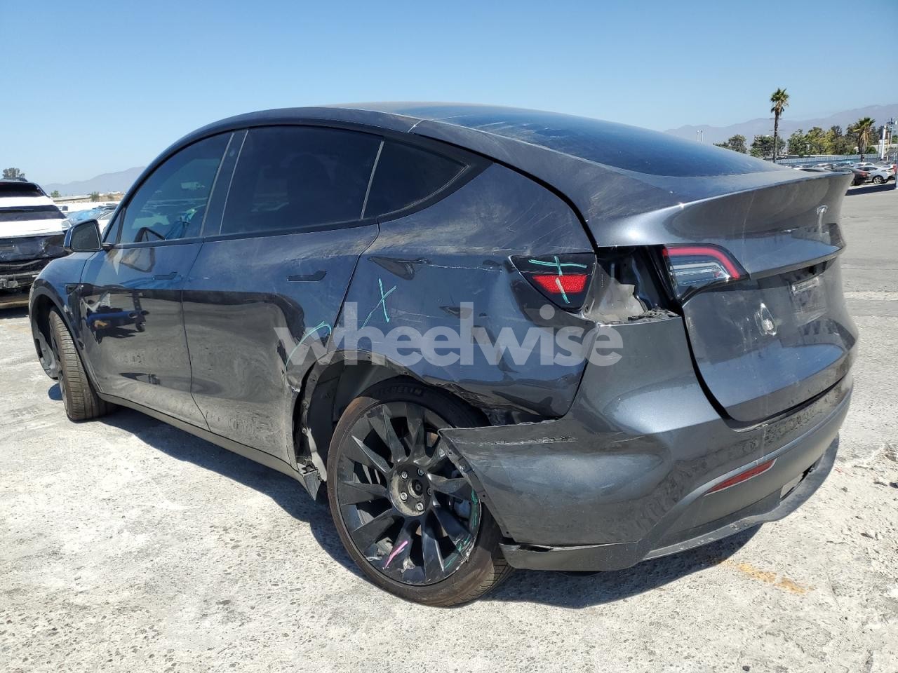 Photo 2 of 2023 TESLA MODEL Y (VIN 7SAYGAEE5PF752333)