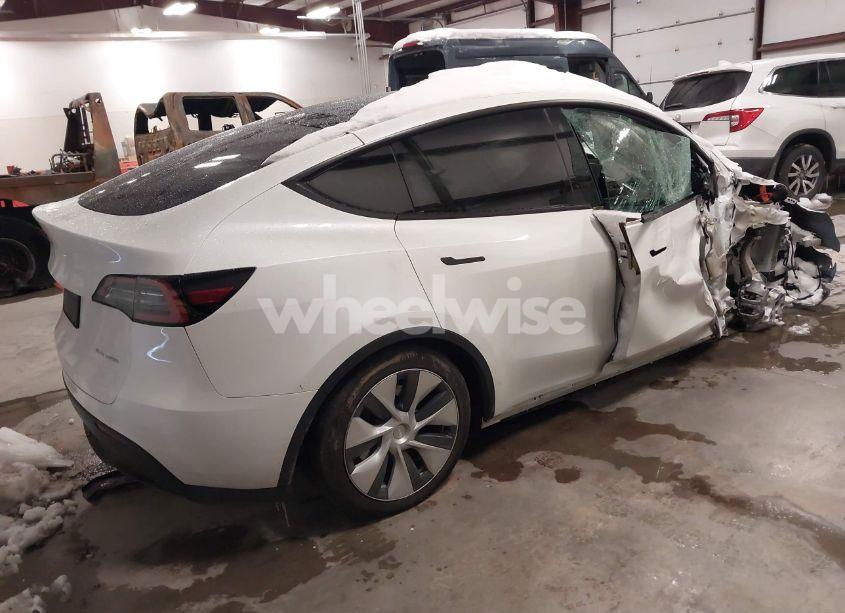 Photo 4 of 2023 Tesla Model Y AWD/LONG RANGE DUAL MOTOR ALL-WHEEL DRIVE (VIN 7SAYGAEE5PF776101)