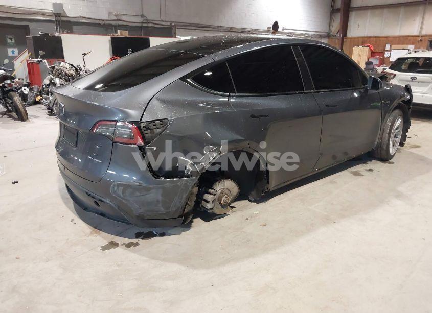 Photo 4 of 2023 Tesla Model Y AWD/LONG RANGE DUAL MOTOR ALL-WHEEL DRIVE (VIN 7SAYGAEE5PF832344)