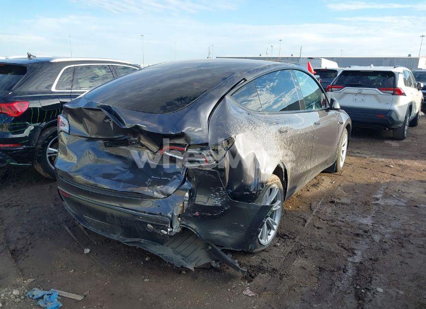 Photo 4 of 2023 Tesla Model Y AWD/LONG RANGE DUAL MOTOR ALL-WHEEL DRIVE (VIN 7SAYGAEE5PF895329)