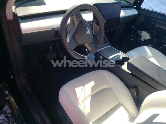 Photo 2 of 2023 TESLA MODEL Y (VIN 7SAYGAEE6PF792033)