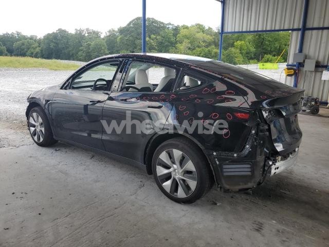 Photo 4 of 2023 TESLA MODEL Y (VIN 7SAYGAEE6PF792033)