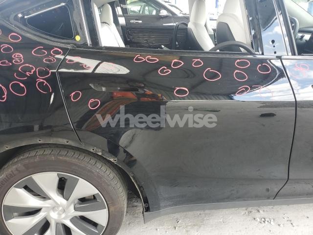 Photo 6 of 2023 TESLA MODEL Y (VIN 7SAYGAEE6PF792033)