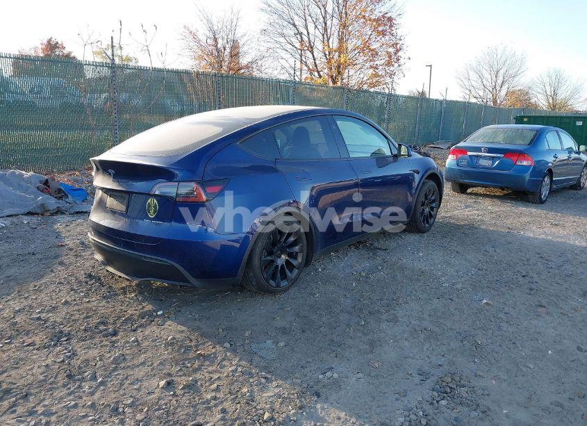 Photo 4 of 2023 Tesla Model Y AWD/LONG RANGE DUAL MOTOR ALL-WHEEL DRIVE (VIN 7SAYGAEE6PF849217)