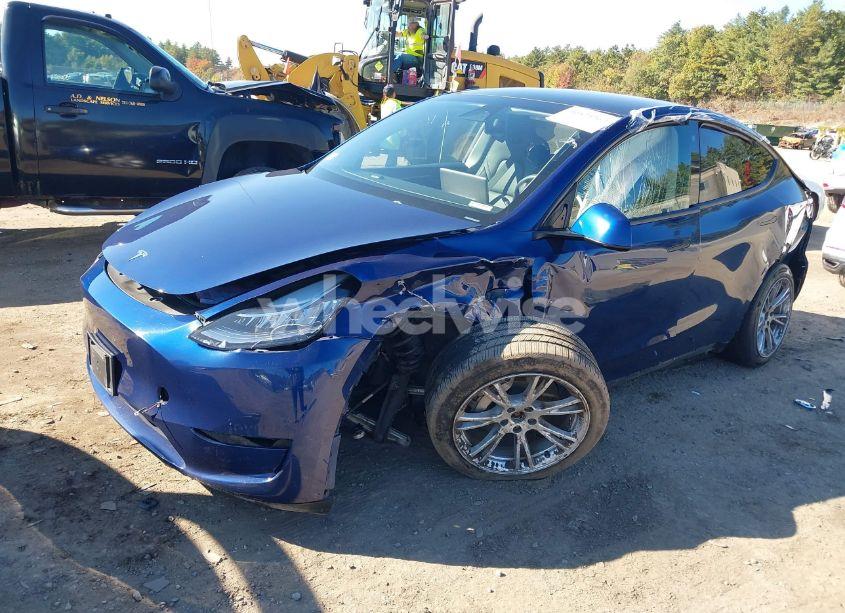 Photo 2 of 2023 Tesla Model Y (VIN 7SAYGAEE7PF611442)